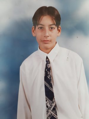Me at my bar mitzvah. Keanu Reeves hair, over sized shirt, and innocence.